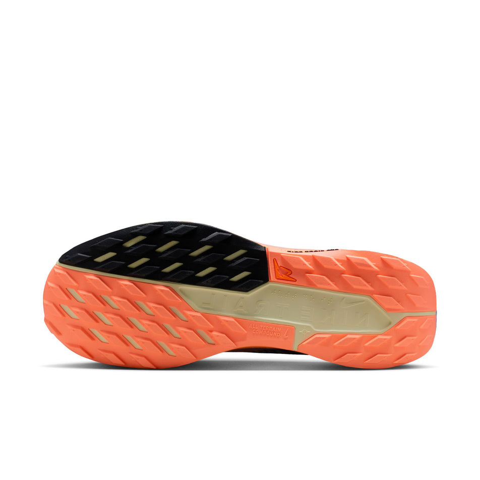 The outsole of the left shoe from a pair of Nike Men's Pegasus Trail 5 GORE-TEX Waterproof Trail Running Shoes in the Ghost/Black-Malt-Orange Pulse colourway. (8754906202274)