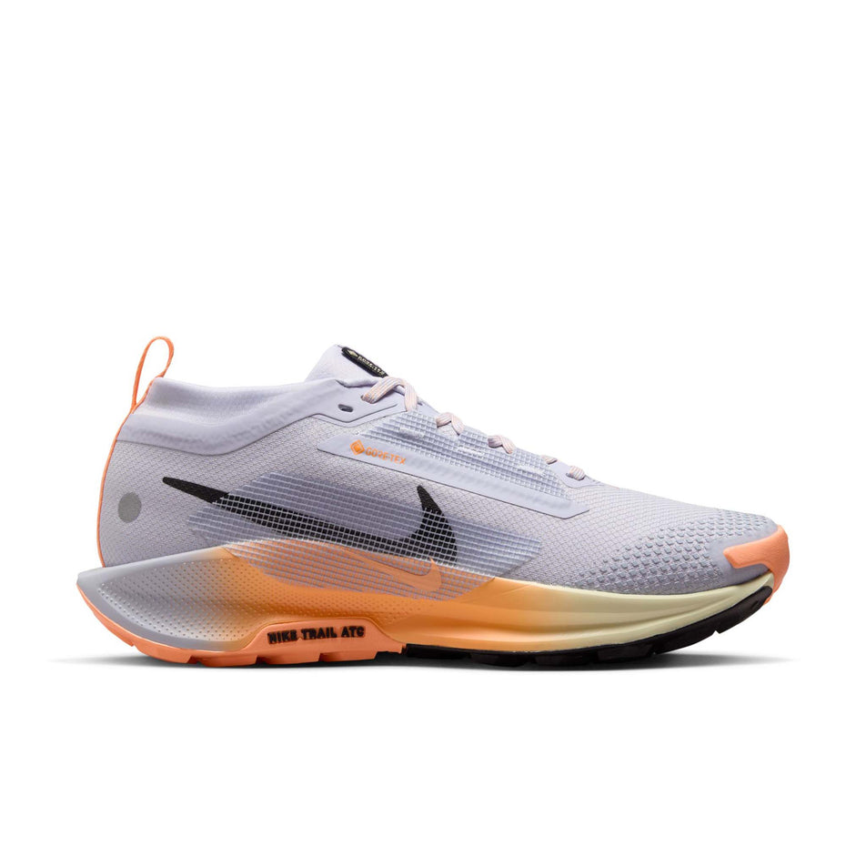 Lateral view of the right shoe from a pair of Nike Women's Pegasus Trail 5 GORE-TEX Waterproof Trail Running Shoes in the Ghost/Black-Malt-Orange Pulse colourway. (8756166131874)