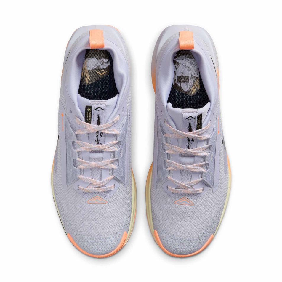 The uppers of a pair of Nike Women's Pegasus Trail 5 GORE-TEX Waterproof Trail Running Shoes in the Ghost/Black-Malt-Orange Pulse colourway. (8756166131874)
