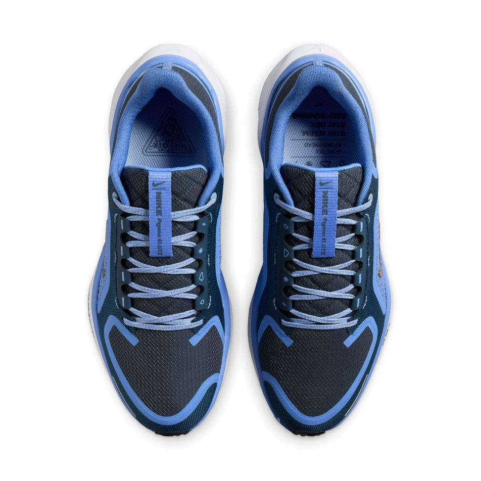 The uppers on a pair of Nike Women's Pegasus 41 GORE-TEX Waterproof Road Running Shoes in the Cobalt/Bliss/Mtlc Red Bronze-Armory Navy colourway. (8506860634274)
