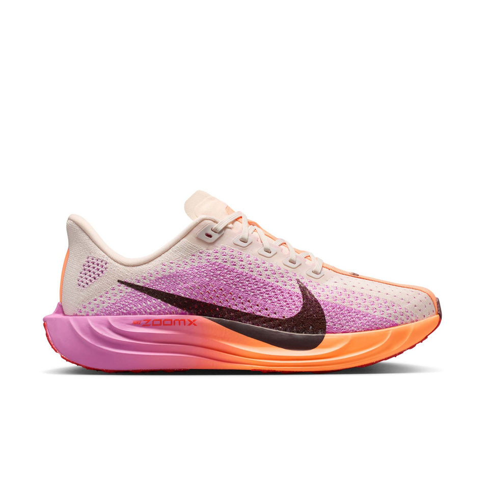 Lateral view of the right shoe from a pair of Nike Women's Pegasus Plus Road Running Shoes in the Chalk/Tattoo-Light Magenta-Bright Crimson colourway.