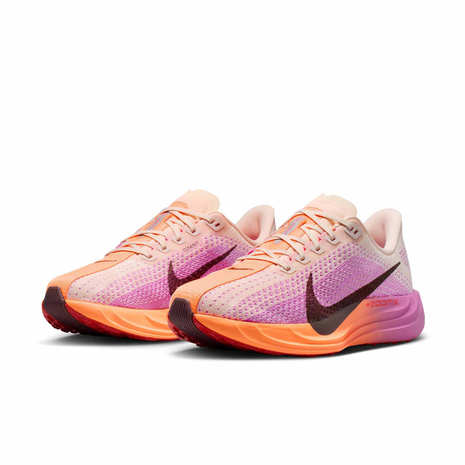 A pair of Nike Women's Pegasus Plus Road Running Shoes in the Chalk/Tattoo-Light Magenta-Bright Crimson colourway.