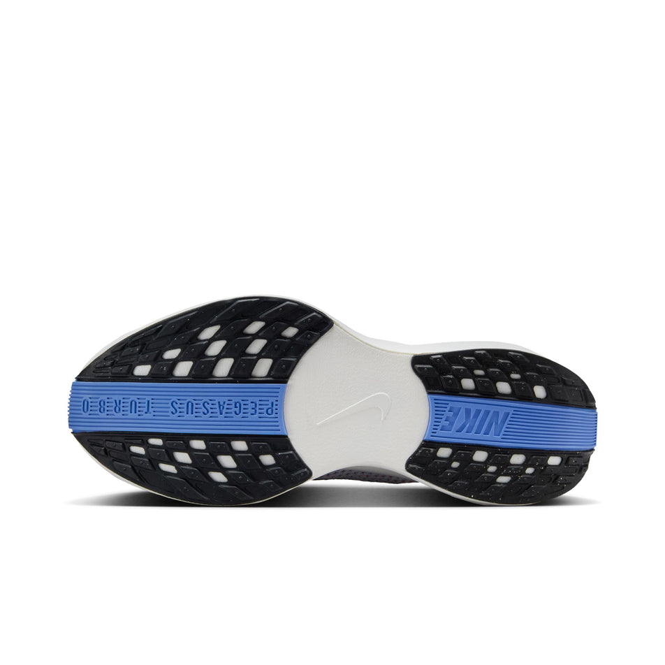 The outsole on the left shoe from a pair of Nike Women's Pegasus Plus Road Running Shoes in the Aluminium/Black-Royal Pulse White colourway. (8558431240354)