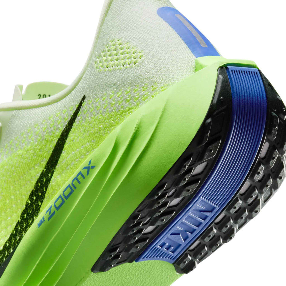 Close-up view of the rearfoot section of the left shoe from a pair Nike Men's Pegasus Plus Road Running Shoes in the Volt Ice/Black Spruce-Volt Tint colourway.