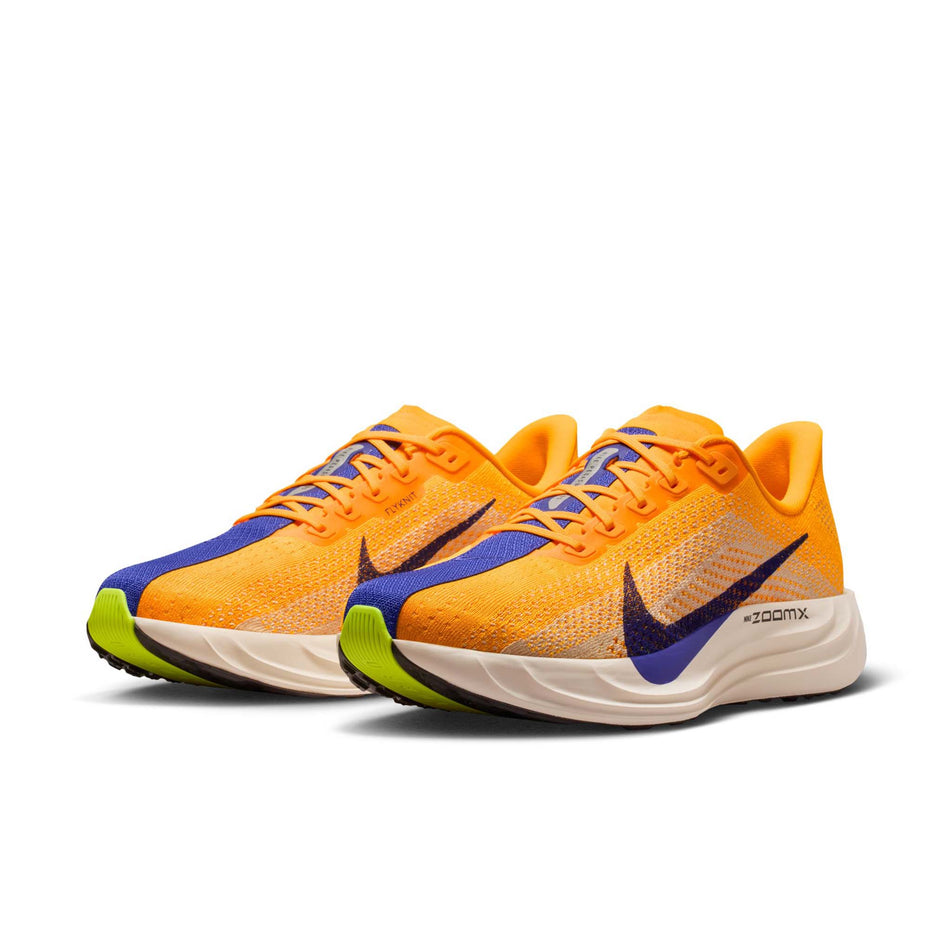 A pair of Nike Men's Pegasus Plus Road Running Shoes in the Laser Orange/Indigo Burst-Alabaster-Sail colourway.