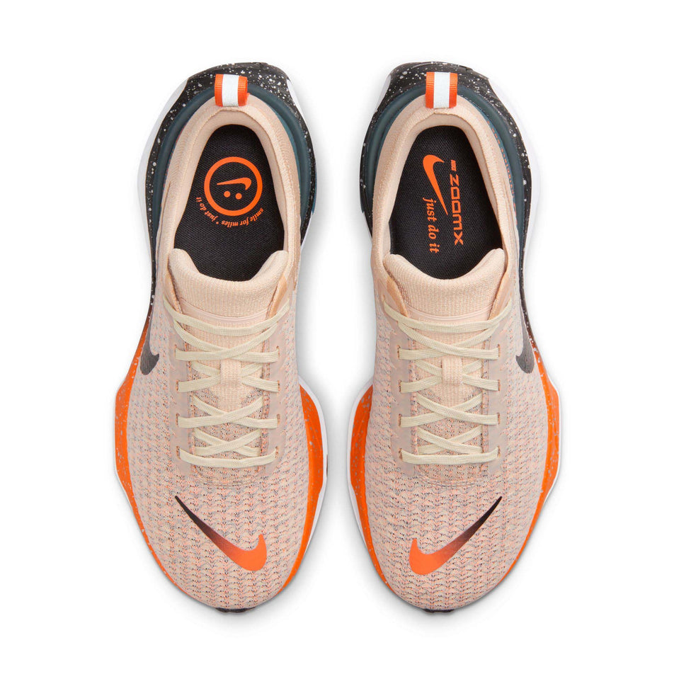 The uppers on a pair of Nike Men's Invincible Run 3 Road Running Shoes in the Oatmeal/Black-Safety Orange-Total Orange colourway (8073007661218)
