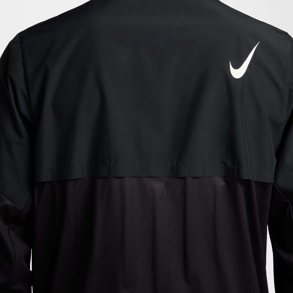 Back view of the Nike Men's AeroSwift Storm-FIT Aerogami Running Jacket in the Black/Summit White colourway.
