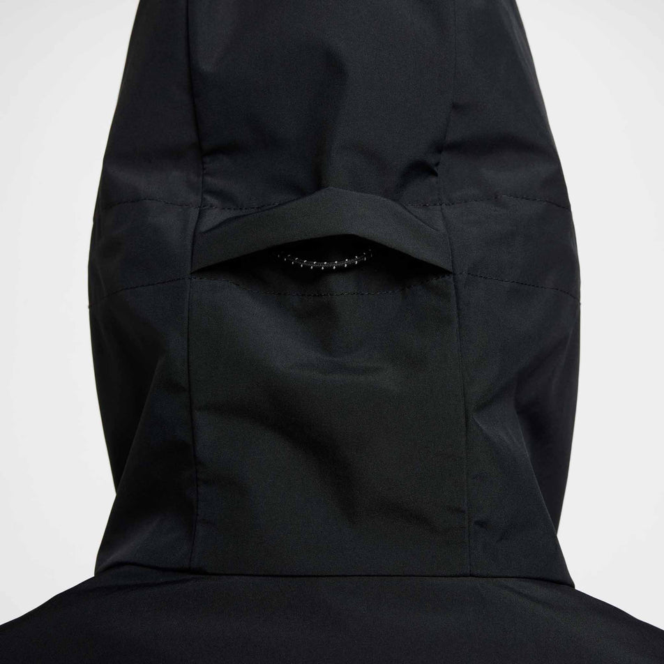 Back view of the hood of the Nike Men's AeroSwift Storm-FIT Aerogami Running Jacket in the Black/Summit White colourway.