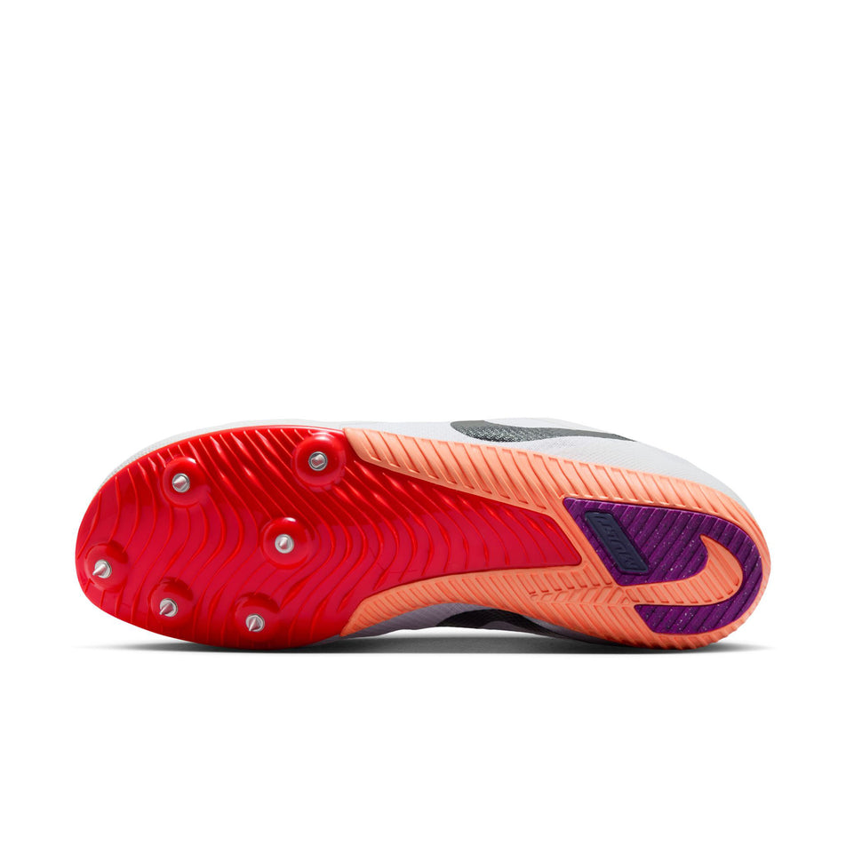 The outsole of the left shoe from a pair of Nike Unisex Zoom Rival Track & Field Multi-Event Spikes in the White/Obsidian-Bright Crimson colourway. (8756172783778)