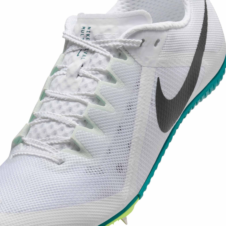 Close up of the upper of the left shoe from a pair of Nike Unisex Zoom Rival Track & Field Multi-Event Spikes in the White/Black-Bright Spruce-Vapor Green colourway. (8654114029730)