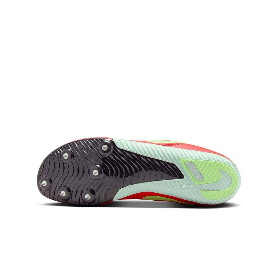 The outsole on the left shoe from a pair of Nike Zoom Rival Track & Field Multi-Event Spikes in the Bright Crimson/Washed Coral-Lime Blast colourway. (8574678794402)