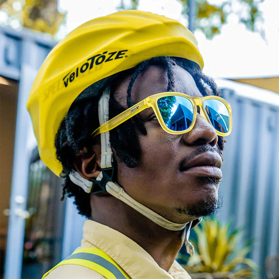 A model wearing a pair of goodr Swedish Meatball Hangover - OG - Running Sunglasses