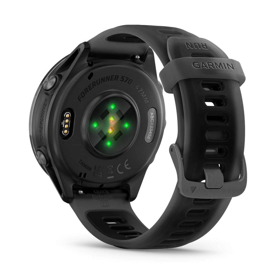 A Garmin Forerunner 570 in the 47mm case size. Slate Grey Aluminium with Translucent Black/Black Band. Back of watch and wrist-based heart rate monitor. (8692375322786)