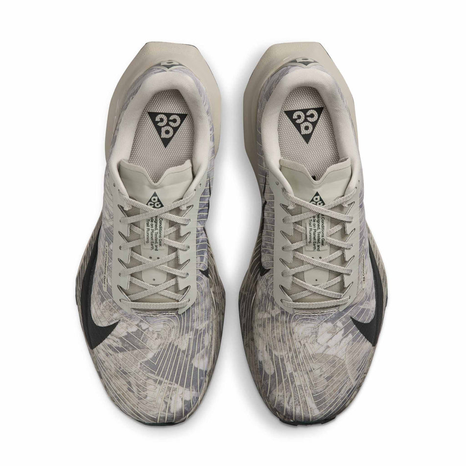 The uppers of a pair of Nike Unisex ACG Ultrafly Trail Racing Shoes in the Spruce Fog/Black Spruce-Sea Glass colourway.