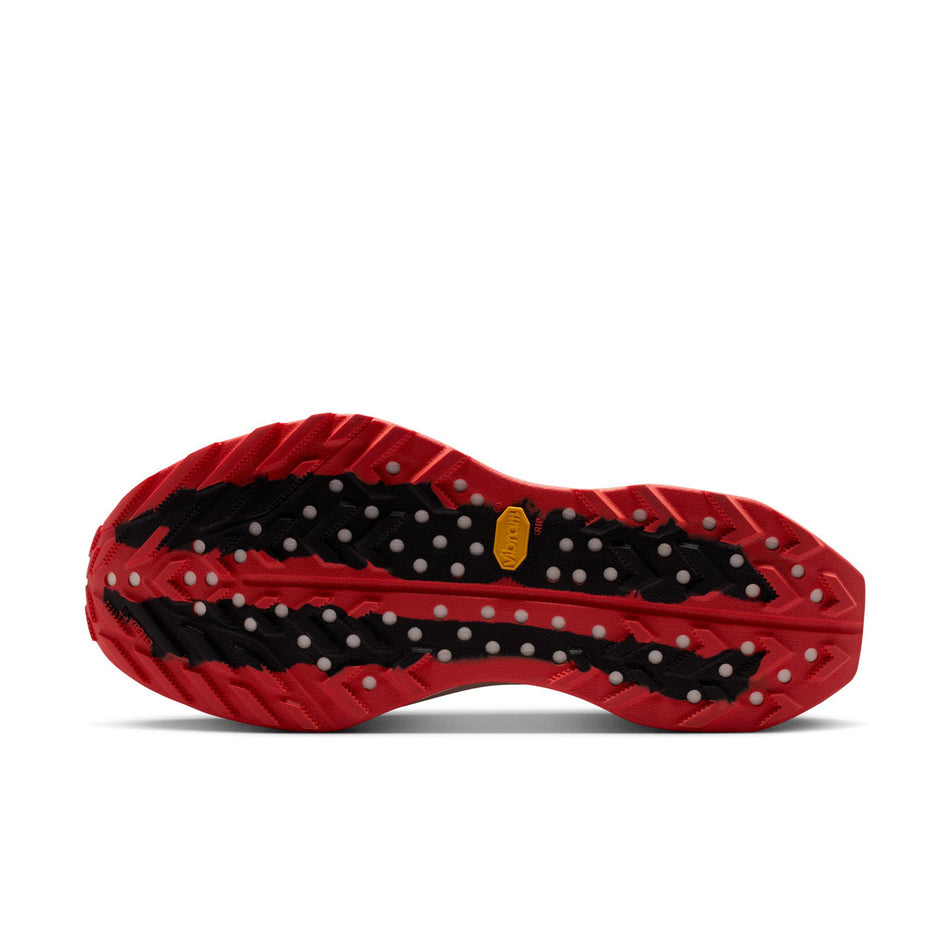 The outsole of the left shoe from a pair of Nike Unisex ACG Ultrafly Trail Racing Shoes in the Light Crimson/Pure Platinum-Summit White colourway.