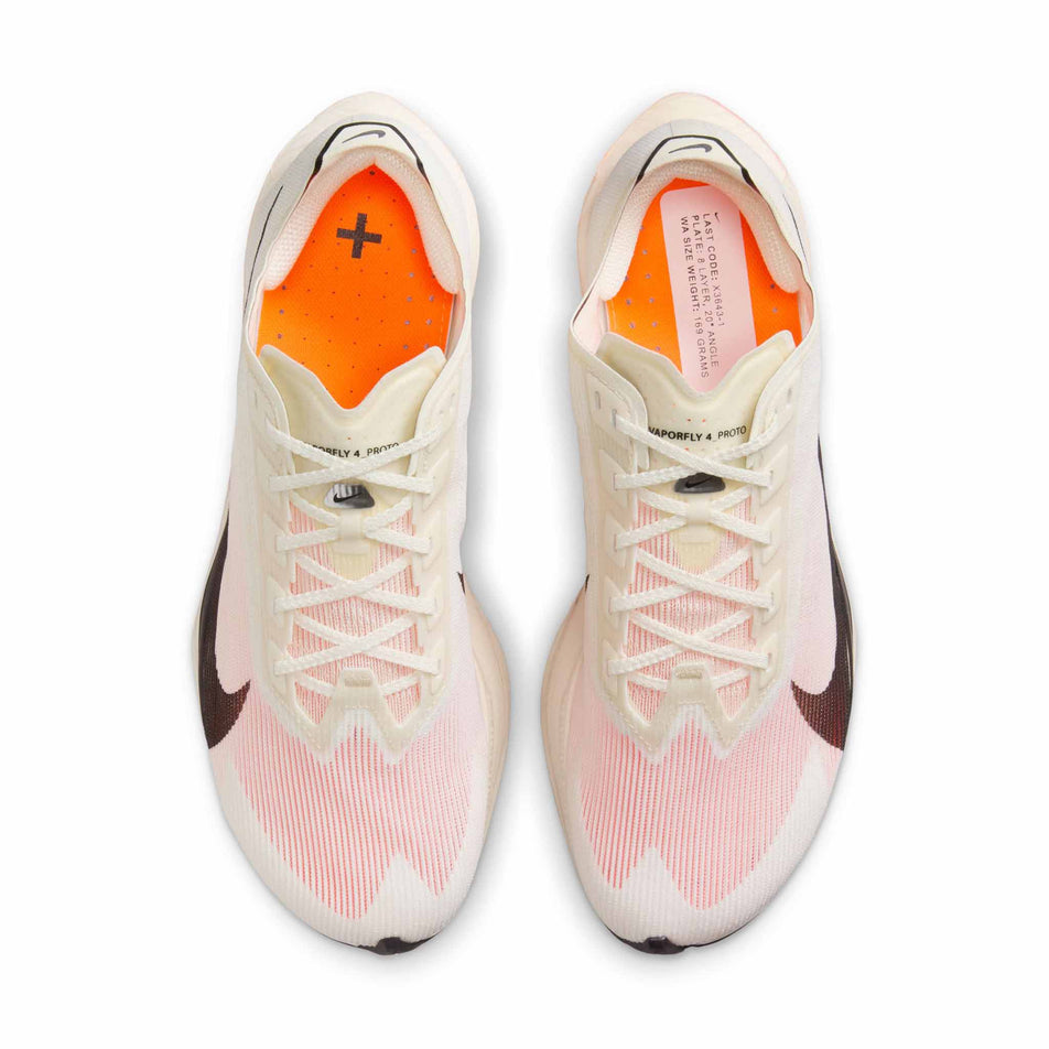 The uppers of a pair of Nike Women's Vaporfly 4 Proto Road Racing Shoes in the Sail/Black-Total Orange-White colourway. (8635888500898)