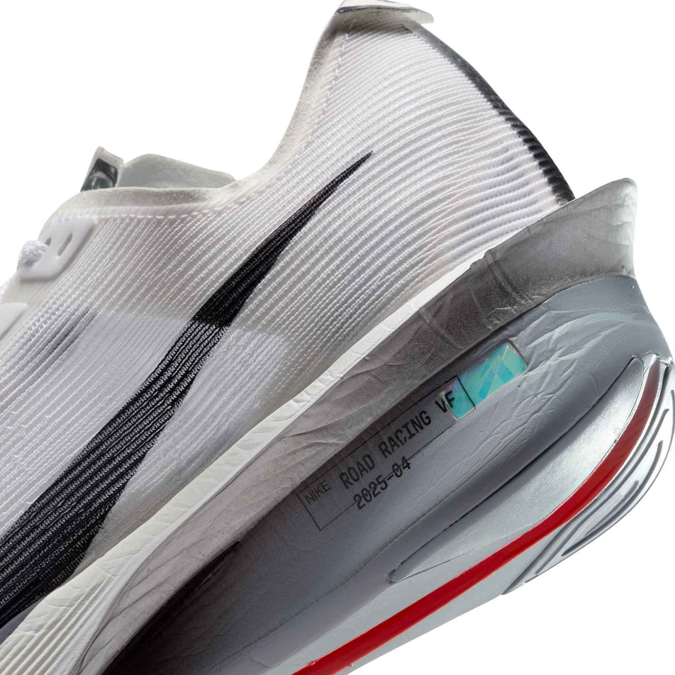 Close up of the midsole of the left shoe from a pair of Nike Women's Vaporfly 4 Road Racing Shoes in the White/Gridiron-Obsidian Mist colourway. (8614572720290)