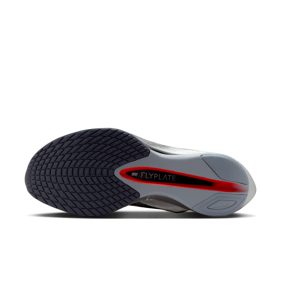 The outsole of the left shoe from a pair of Nike Women's Vaporfly 4 Road Racing Shoes in the White/Gridiron-Obsidian Mist colourway. (8614572720290)