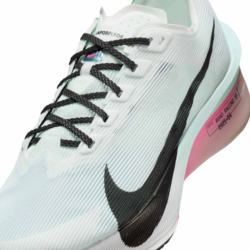 Close up of the upper of the left shoe from a pair of Nike Women's Vaporfly 4 Road Racing Shoes in the White/Black-Hyper Pink-Mint Foam colourway. (8684673007778)