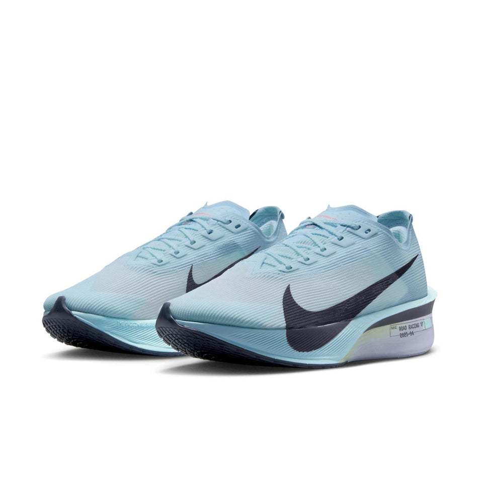 A pair of Nike Women's Vaporfly 4 Road Racing Shoes in the Glacier Blue/Gridiron-Blue Tint colourway. (8614577569954)