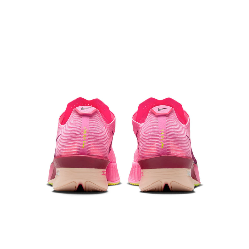 The back of a pair of Nike Women's Vaporfly 4 Road Racing Shoes in the Pink Spell/Bordeaux-Hyper Pink-Volt Ice colourway. (8756141195426)