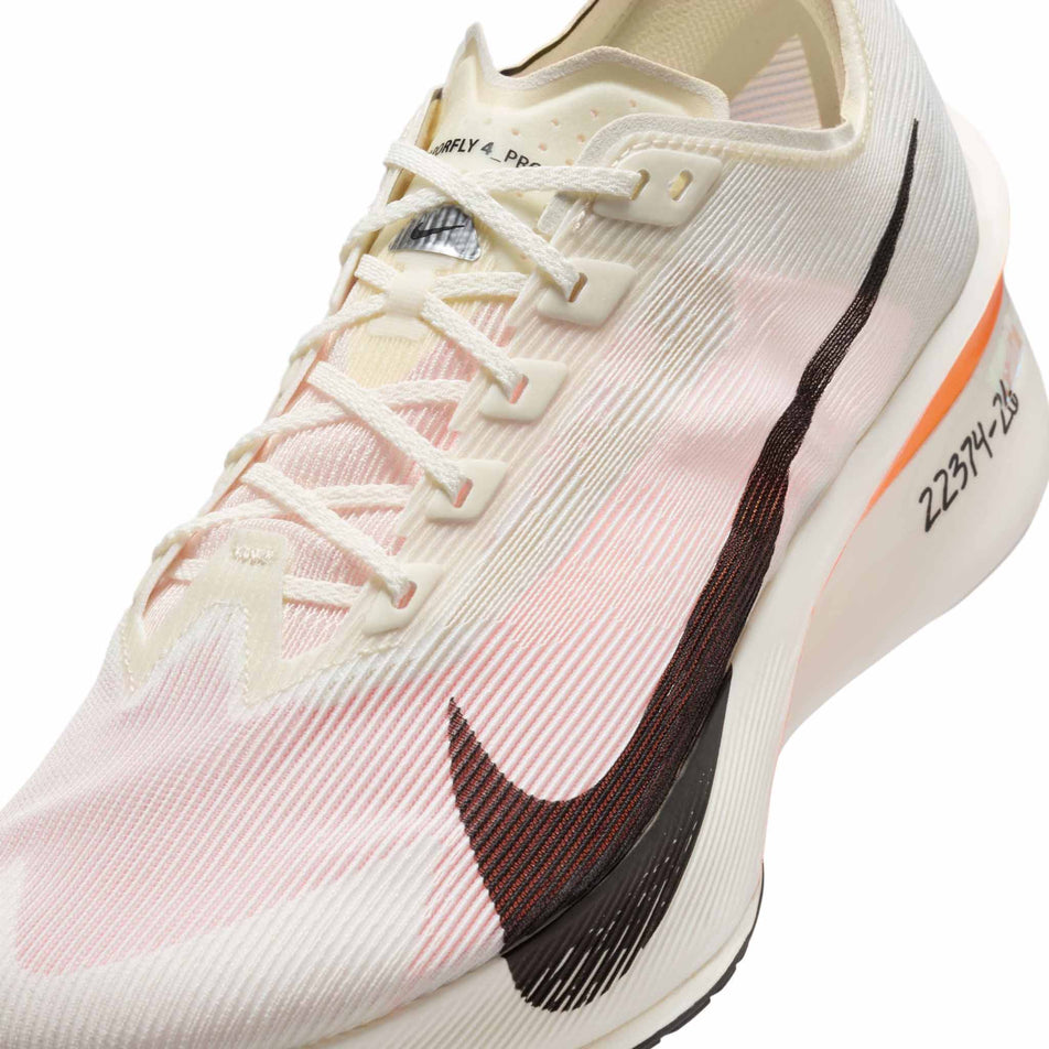 Angled view of the left shoe from a pair of Nike Men's Vaporfly 4 Proto Road Racing Shoes in the Sail/Black-Total Orange-White colourway. (8635866808482)
