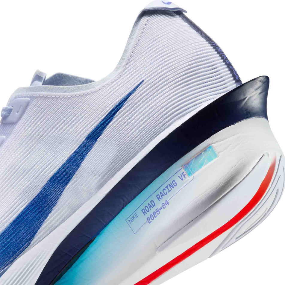 Close up of the midsole of the left shoe from a pair of Nike Men's Vaporfly 4 Road Racing Shoes in the Ghost/Blue Void-Persian Violet colourway. (8613787304098)