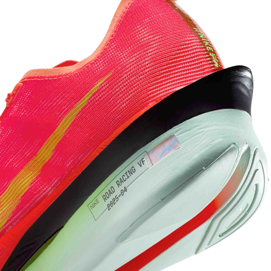 Close up of the midsole of the left shoe from a pair of Nike Men's Vaporfly 4 Road Racing Shoes in the Bright Crimson/Lime Blast-Mint Foam colourway. (8613801361570)