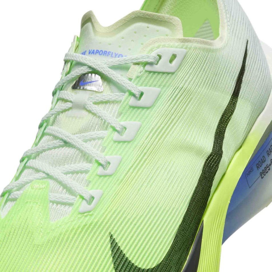 Close-up view of the upper of the left shoe from a pair of Nike Men's Streakfly 2 Road Racing Shoes in the Barely Green/Black Spruce-Volt Ice colourway.
