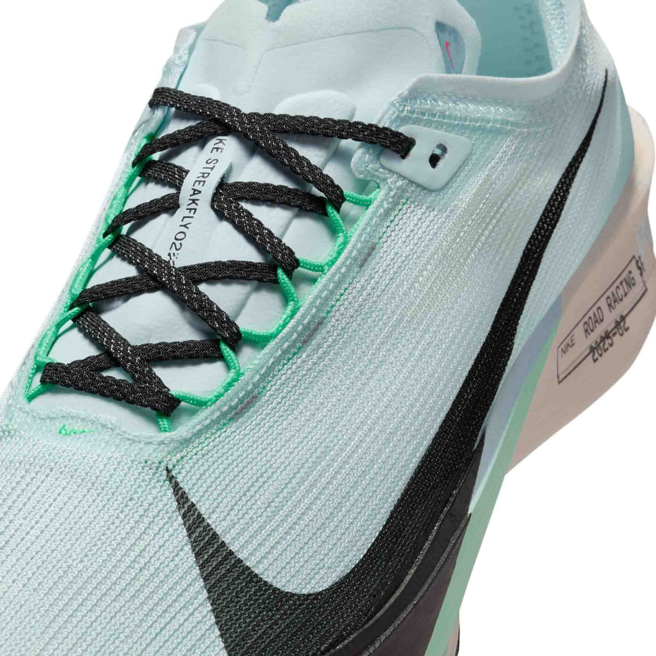 Close up of the upper of the left shoe from a pair of Nike Men's Streakfly 2 Road Racing Shoes in the Glacier Blue/Black-Mint Foam colourway. (8683259429026)