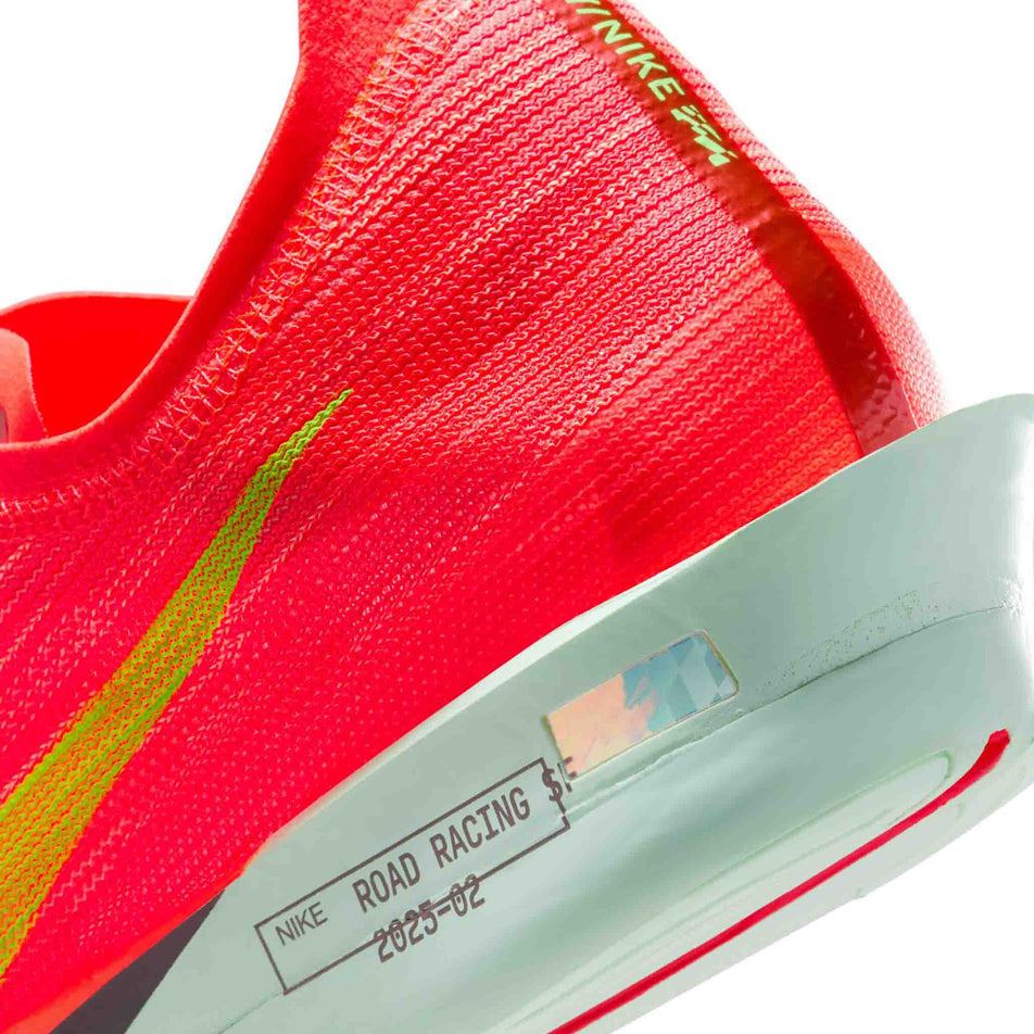 Close up of the midsole of the left shoe from a pair of Nike Men's Streakfly 2 Road Racing Shoes in the Bright Crimson/Lime Blast-Hyper Orange colourway. (8613896519842)