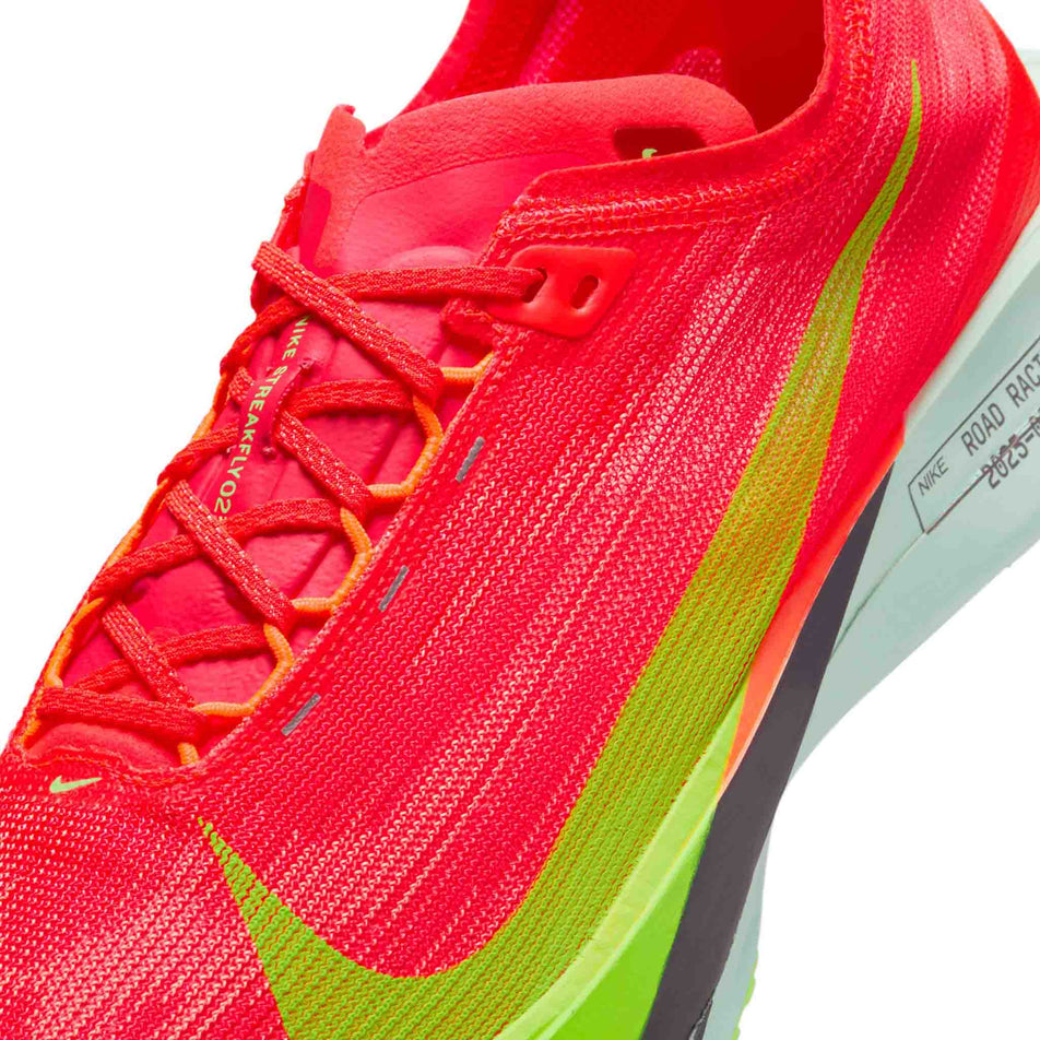 Close up of the upper of the left shoe from a pair of Nike Men's Streakfly 2 Road Racing Shoes in the Bright Crimson/Lime Blast-Hyper Orange colourway. (8613896519842)