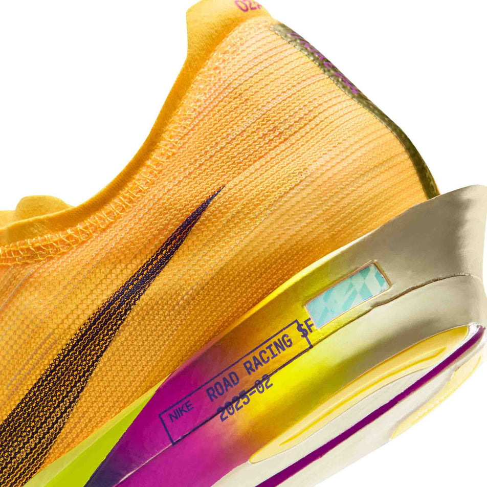 Close-up view of the rearfoot section of the left shoe from a pair of Nike Men's Streakfly 2 Road Racing Shoes in the Citron Pulse/Indigo Burst-Volt Ice colourway.