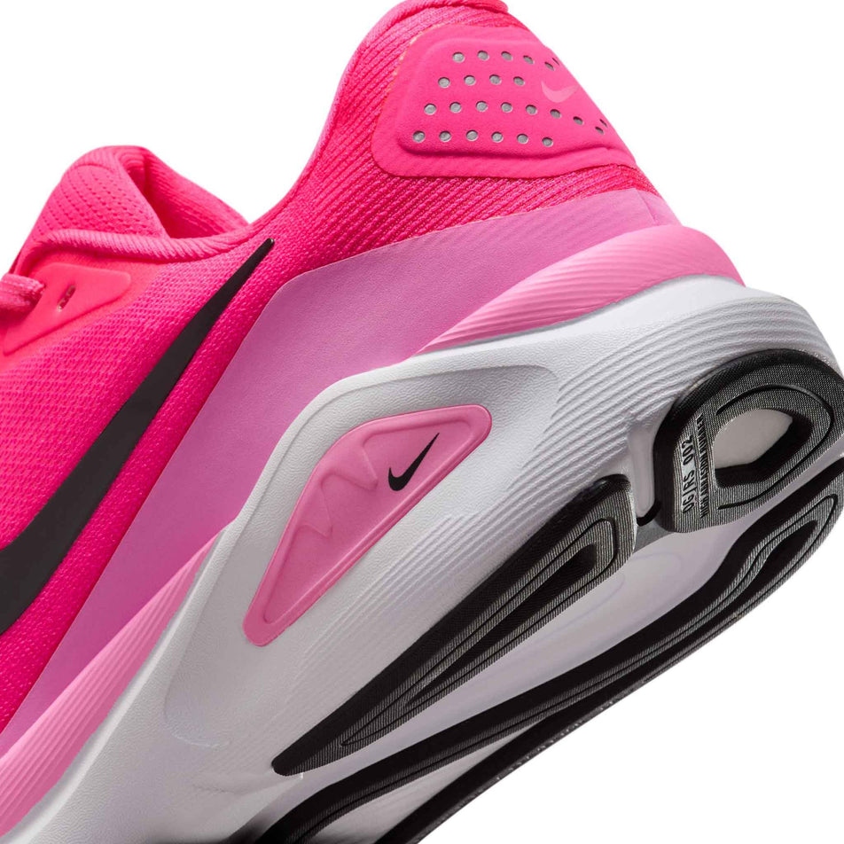 Close up of the midsole of the left shoe from a pair of Nike Women's Structure 26 Road Running Shoes in the Hyper Pink/Black-Pink Spell-White colourway. (8686794997922)
