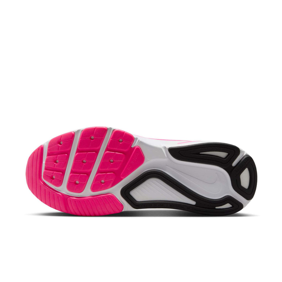 The outsole of the left shoe from a pair of Nike Women's Structure 26 Road Running Shoes in the Hyper Pink/Black-Pink Spell-White colourway. (8686794997922)