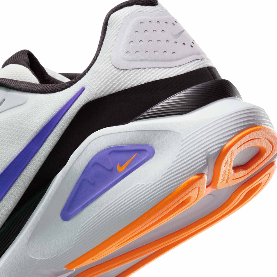 Close up of the midsole of the left shoe from a pair of Nike Men's Structure 26 Road Running Shoes in the Pure Platinum/Persian Violet-Wolf Grey colourway. (8684597543074)