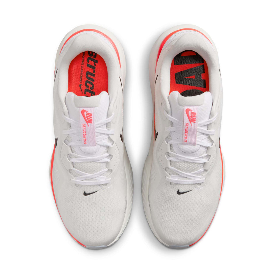 The uppers of a pair of Nike Men's Structure 26 Road Running Shoes in the White/Black-Bright Crimson-Photon Dust colourway. (8684589973666)