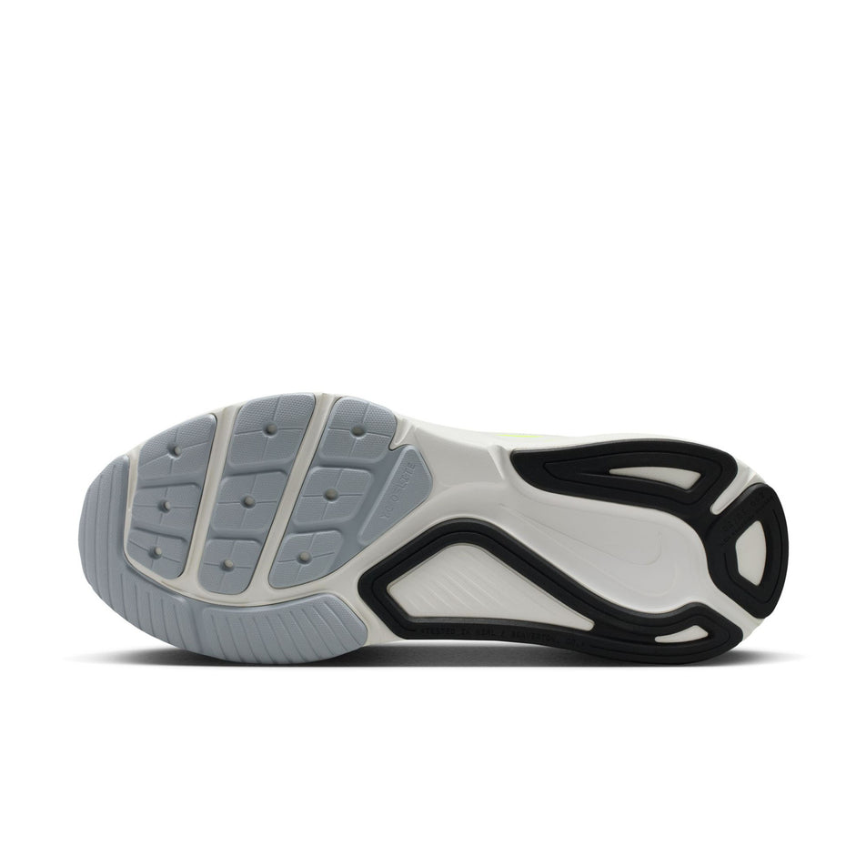 The outsole of the right shoe from a pair of Nike Men's Structure 26 Road Running Shoes in the Summit White/Black-Volt-Total Orange colourway.