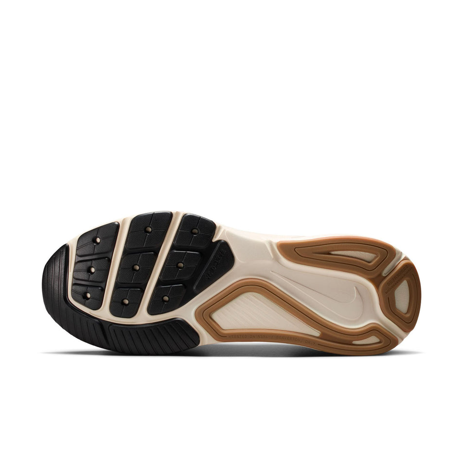 The outsole of the left shoe from a pair of Nike Men's Structure 26 Road Running Shoes in the Medium Ash/Black-College Grey colourway. (8754904891554)