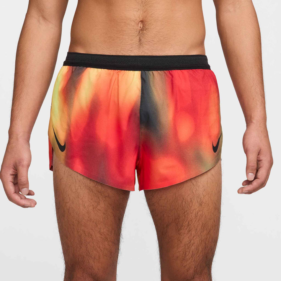 Front view of a model wearing the Nike Men's Dri-FIT AeroSwift Elite Entry Shorts in the Light Lemon Twist  colourway. (8574140317858)