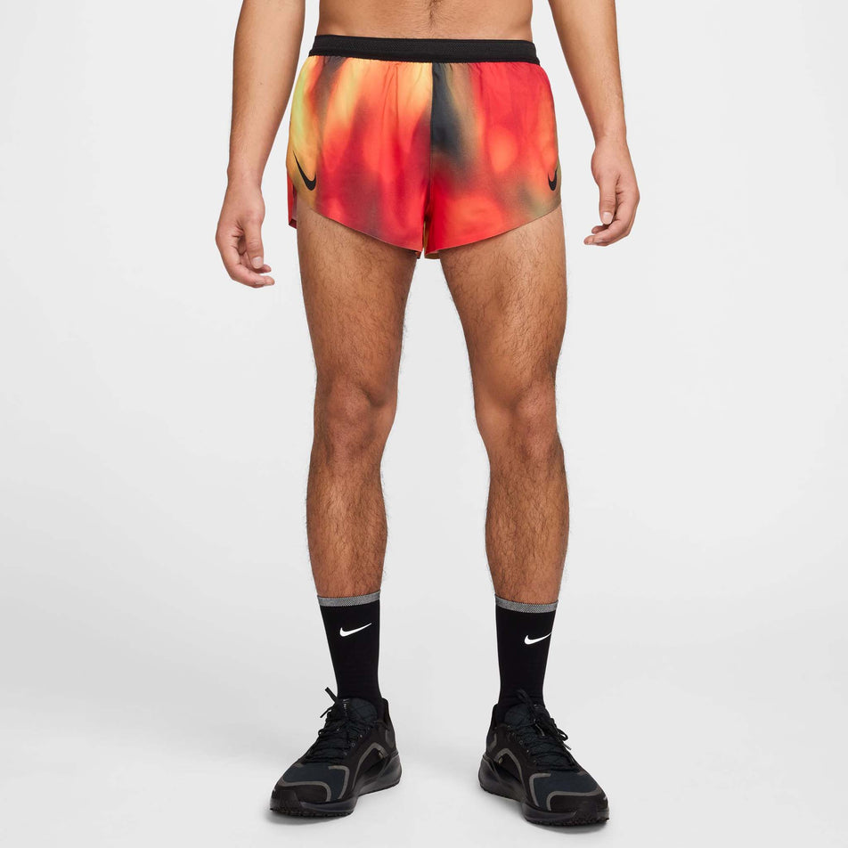 Front view of a model wearing the Nike Men's Dri-FIT AeroSwift Elite Entry Shorts in the Light Lemon Twist  colourway. (8574140317858)