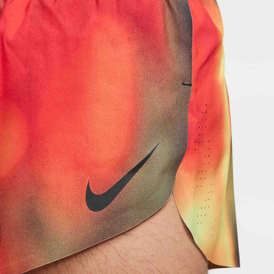 The side split on the Nike Men's Dri-FIT AeroSwift Elite Entry Shorts in the Light Lemon Twist  colourway. (8574140317858)