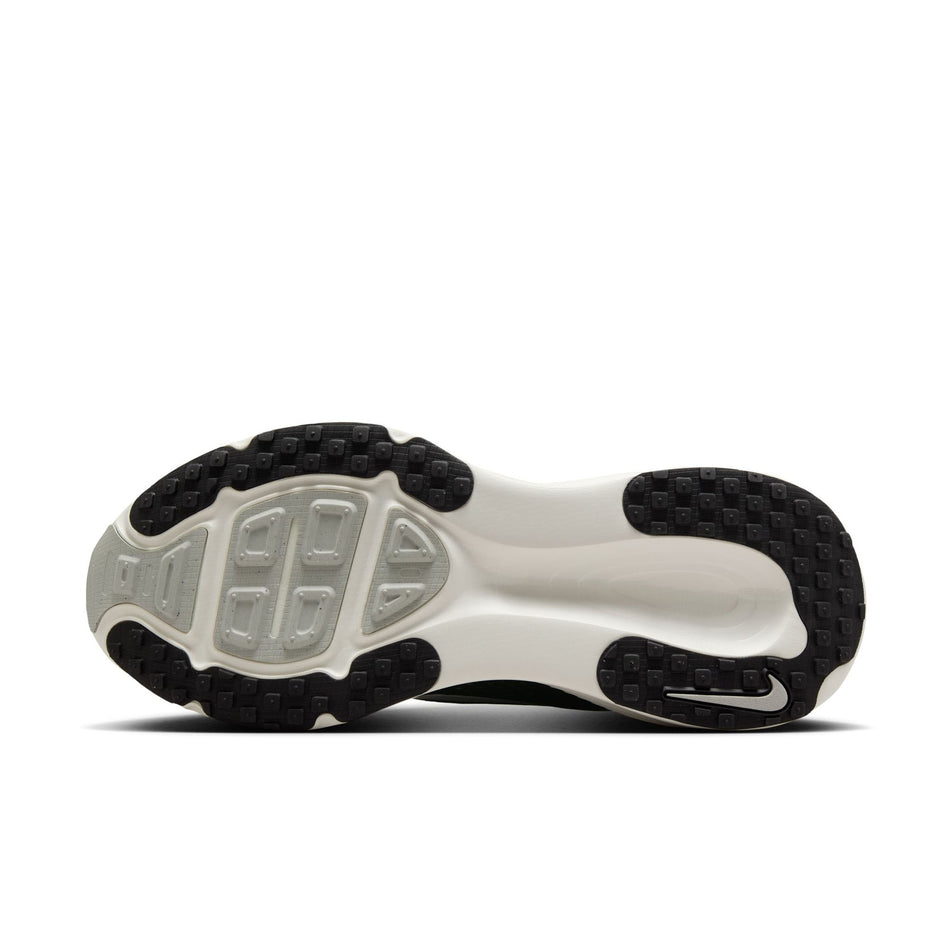 The outsole of the left shoe from a pair of Nike Men's Vomero 18 Road Running Shoes in the Black/Summit White-Coconut Milk colourway. (8684566708386)