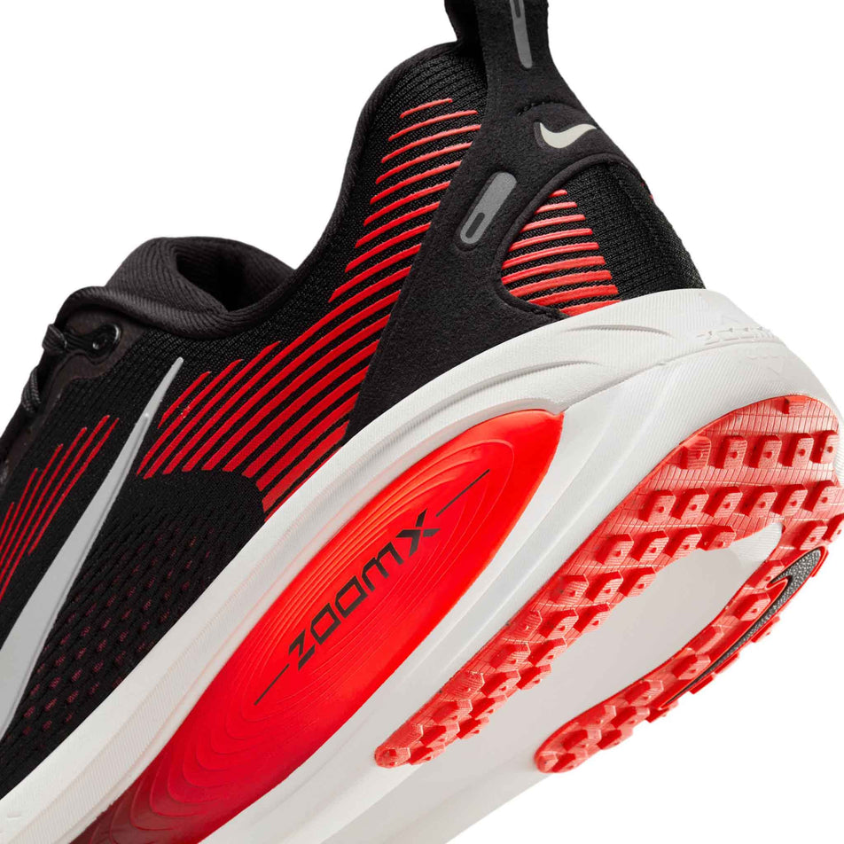 Close up of the midsole of the left shoe from a pair of Nike Men's Vomero 18 Road Running Shoes in the Black/Summit White-Bright Crimson colourway. (8684579061922)