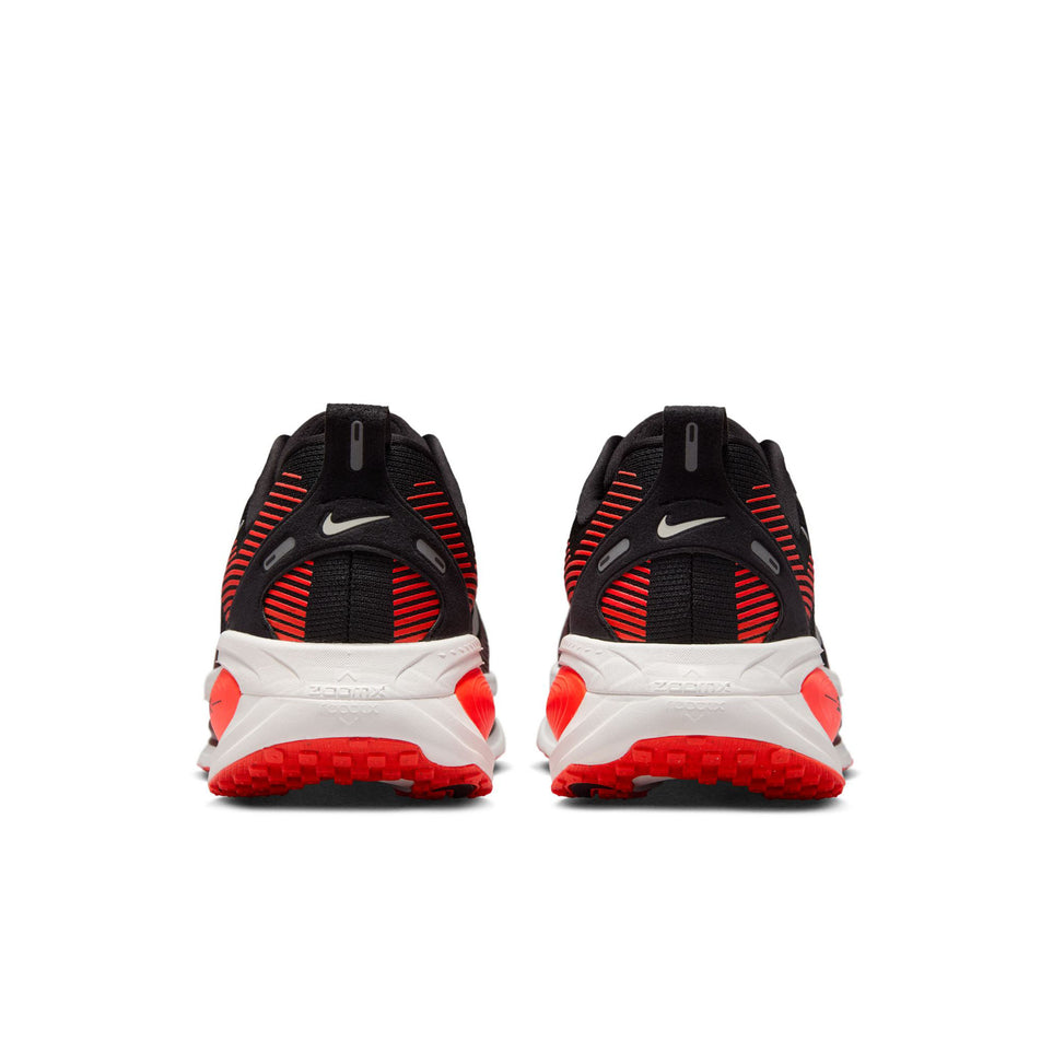 The back of a pair of Nike Men's Vomero 18 Road Running Shoes in the Black/Summit White-Bright Crimson colourway. (8684579061922)