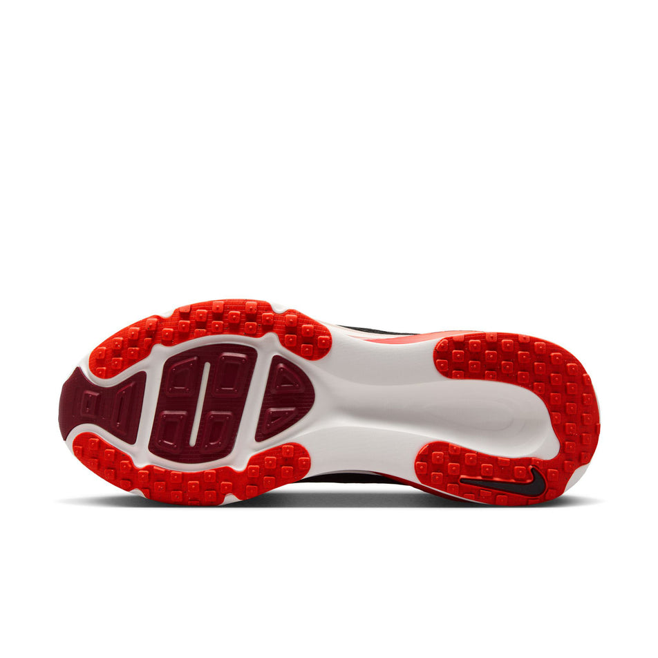 The outsole of the left shoe from a pair of Nike Men's Vomero 18 Road Running Shoes in the Black/Summit White-Bright Crimson colourway. (8684579061922)