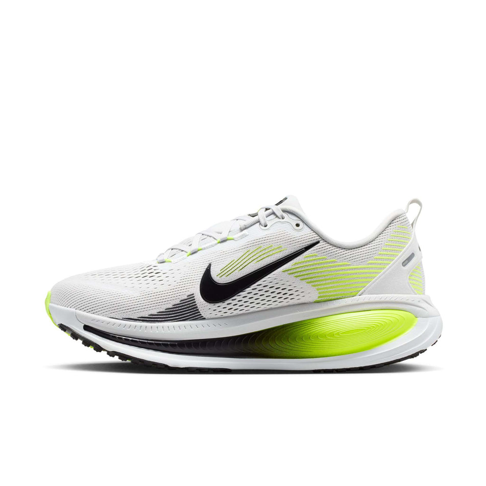 Medial view of the right shoe from a pair of Nike Men's Vomero 18 Road Running Shoes in the Photon Dust/Black-Volt colourway.