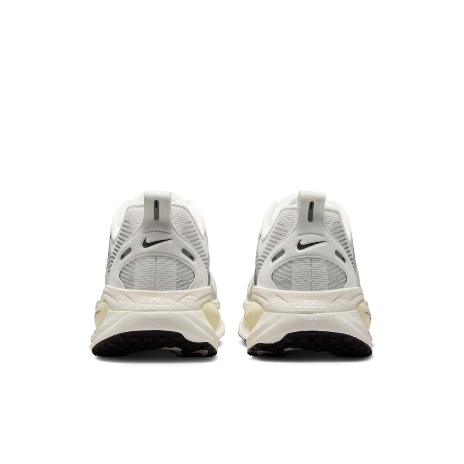 The back of a pair of Nike Men's Vomero 18 Road Running Shoes in the Summit White/Black-Coconut Milk colourway. (8574627086498)