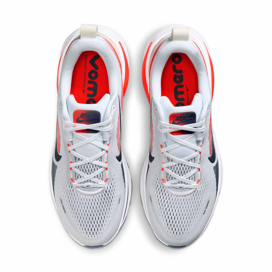 The uppers of a pair of Nike Men's Vomero 18 Road Running Shoes in the White/Midnight Navy-Bright Crimson-Black colourway.