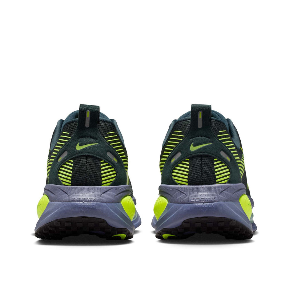 The back of a pair of Nike Men's Vomero 18 Road Running Shoes in the Seaweed/Volt-Cannon-Sanded Purple colourway.